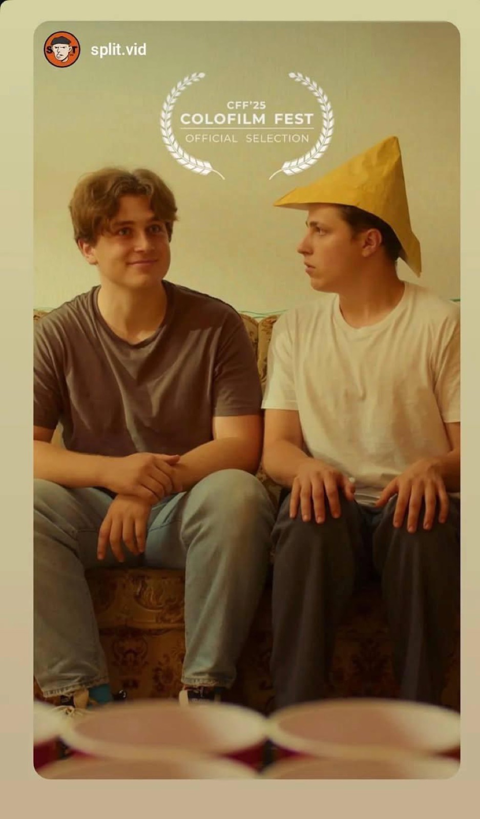 Two friends on a sofa, poster still from Make Me Comfortable