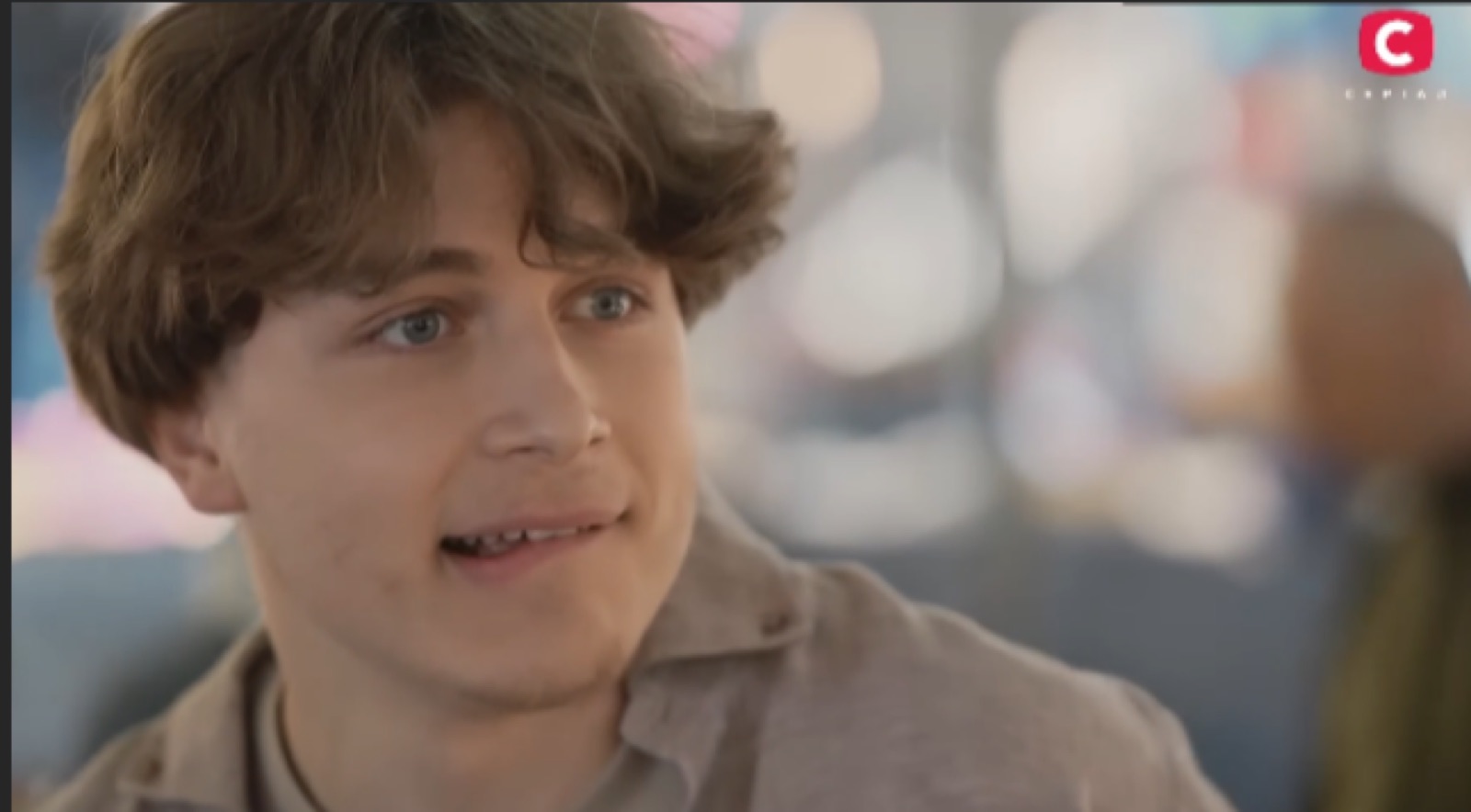 Smiling close-up, television still