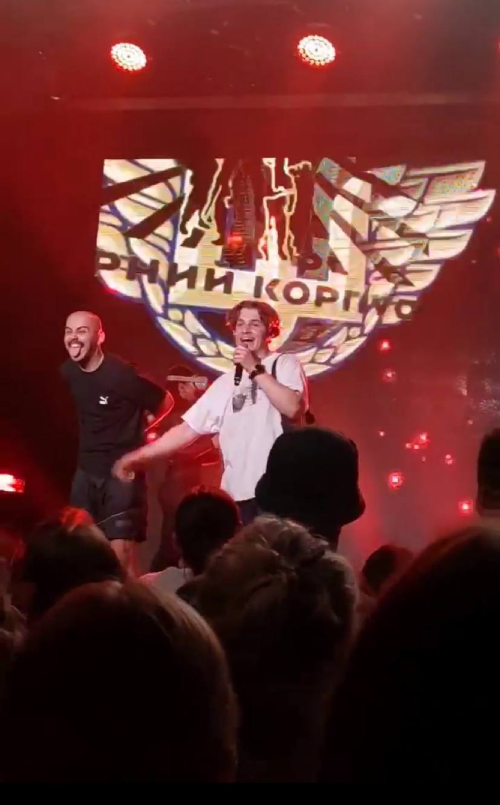 Performing on stage with OTOY under red light
