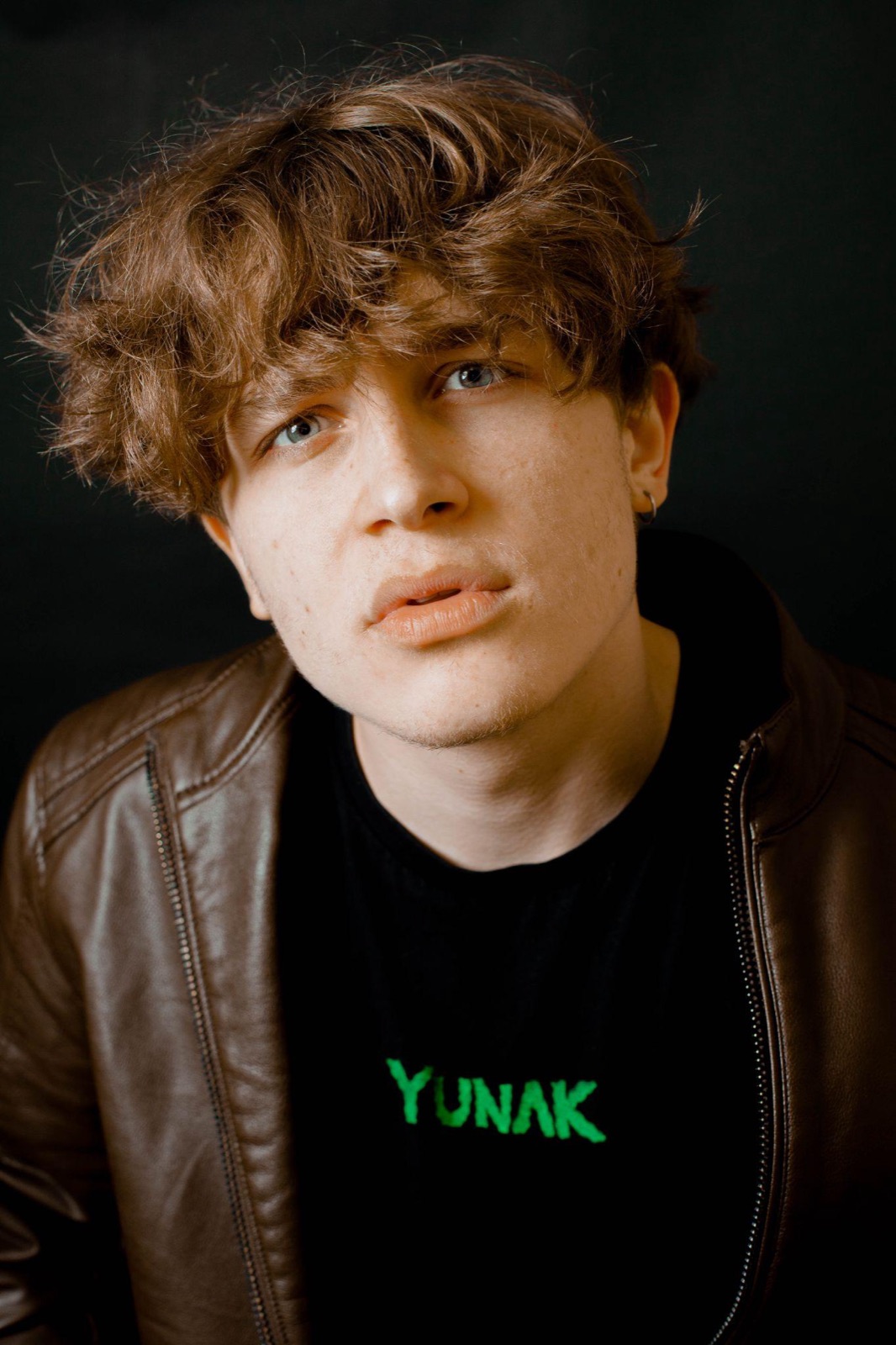 Portrait in a leather jacket and a Yunak T-shirt